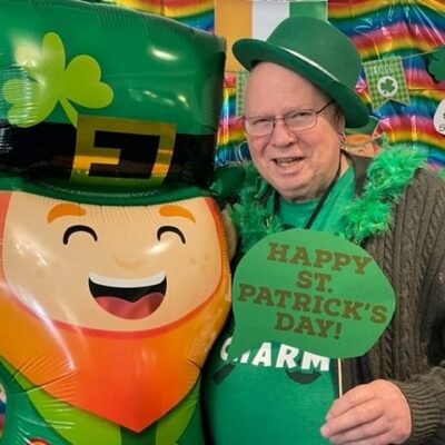 Resident dressed up for St. Patrick’s Day | National Lutheran Communities & Services